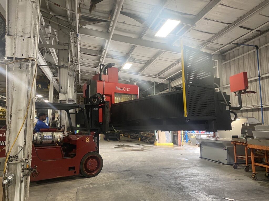 Heavy Machinery & Equipment Riggers Warehouse FLEX CNC Trucking Rigging NYC 1