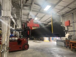 Heavy Machinery & Equipment Riggers Warehouse FLEX CNC Trucking Rigging NYC 1