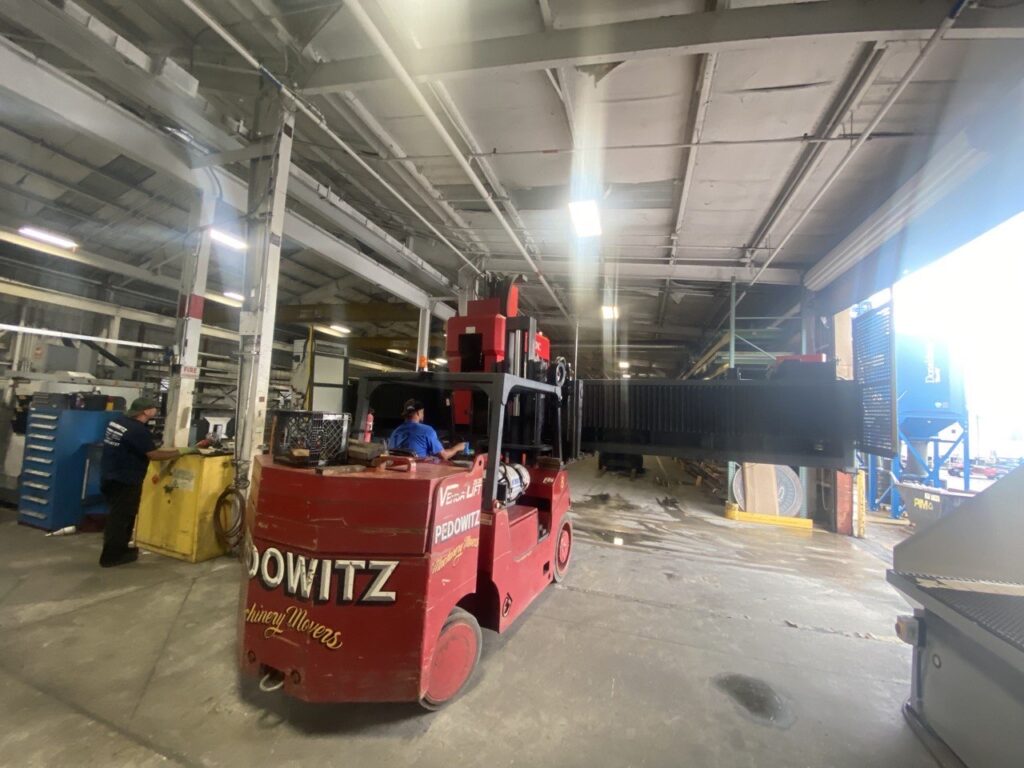 Heavy Machinery & Equipment Riggers Warehouse FLEX CNC Trucking Rigging NYC 2