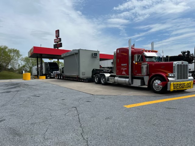 Pedowitz-Machinery-Movers-Charlotte-Carolina-Trucking-Rigging-Company-Oversize-Load-Transport-Chemical-Hut-from-Wilksboro-NC-to-Columbus-GA.jpg