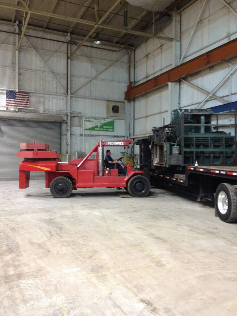 Pedowitz Machinery Movers NYC Oversize Load Riggers Best Heavy Haul Trucking Transport 2 Trash Bailer